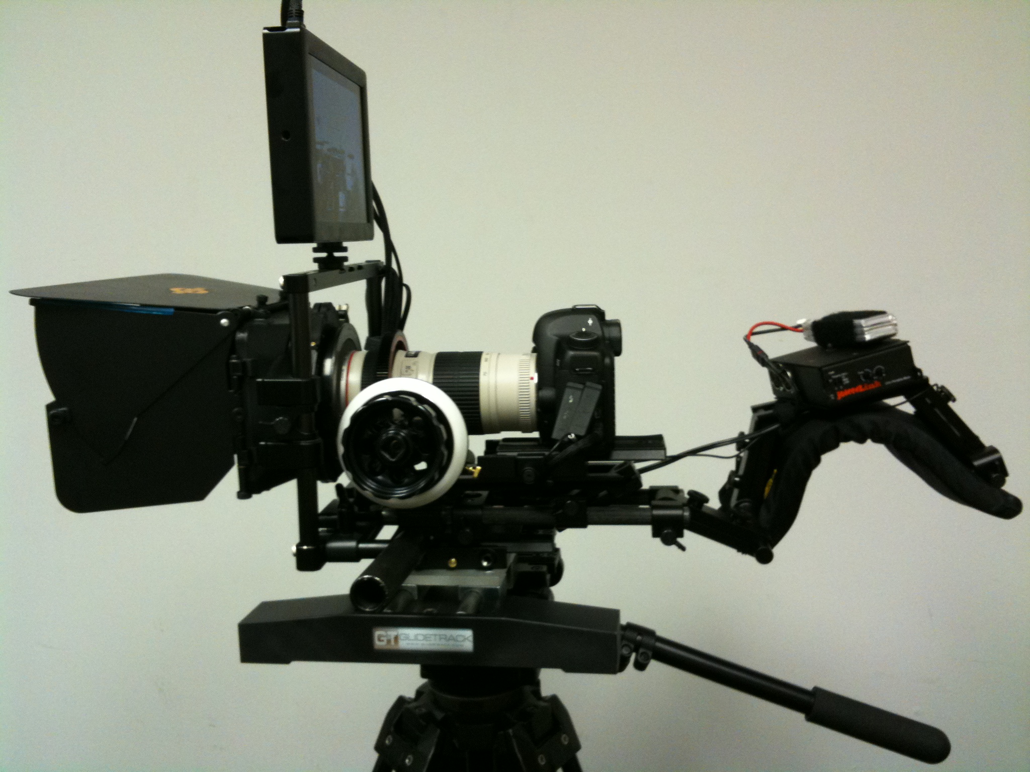 5D Mark II configured for film making with follow focus, matte box, rails, preamp and dolly