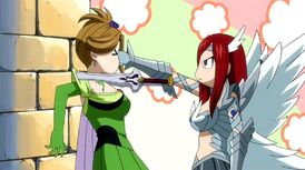 830px-Erza beats Eve