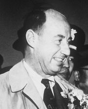 Stevenson and Korean officials at USAF base in Korea, March 1953-cropped to Stevenson