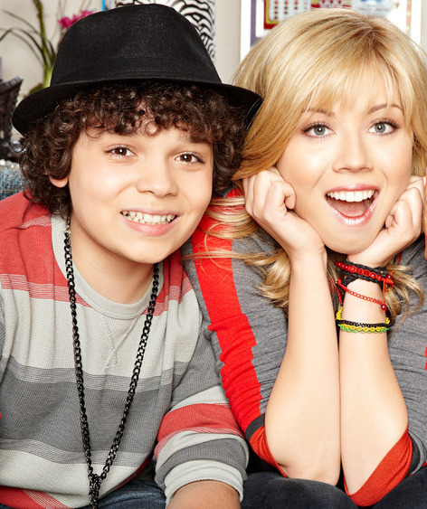 Dice From Sam And Cat Now 2021 Image - Dice and Sam sitting beside each other.jpg - Sam and Cat Wiki