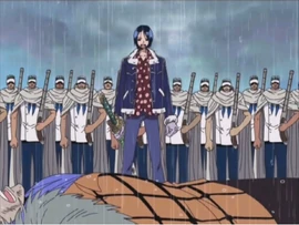 Tashigi removiendo los cargos de Crocodile