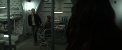 Katniss viendo a su hermana y a su madre en su compartimiento